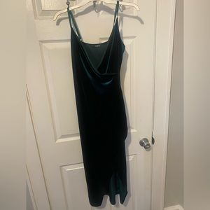 Formal, tight fitted velvet green dress